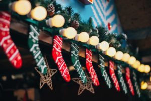 Cabins with stylish christmas decorations on european city market